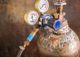 Reducer with pressure gages  on the oxygen  tank, By attaching a devive to prevent the fire back...