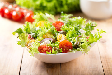 bowl of fresh salad with vegetables