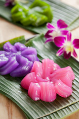 Obraz na płótnie Canvas colorful thai dessert on banana leaf