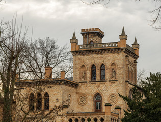 Old building in the Gothic architectural style autumn day
