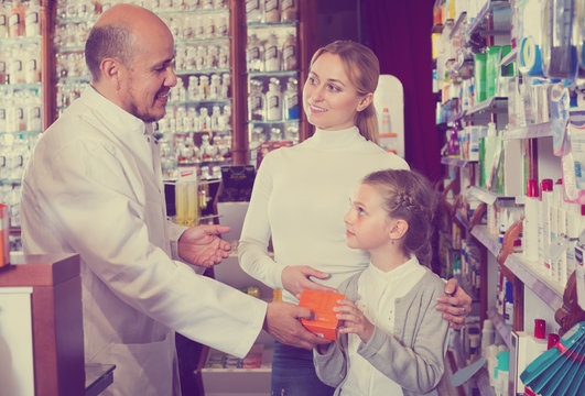 Pharmacist helping customers