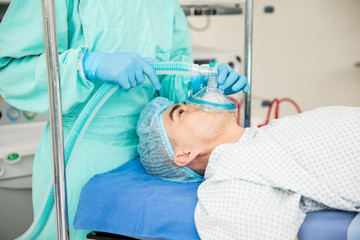 Obraz na płótnie Canvas Patient going to sleep before surgery
