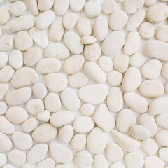 Neutral pattern of beige stones. Flat lay, top view