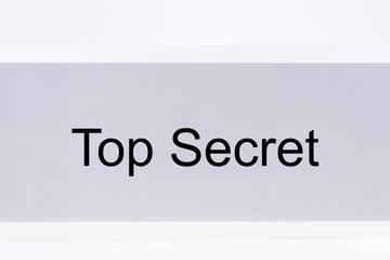 Office folder with the label Top Secret on white background