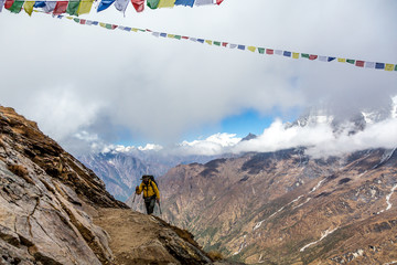 Man approaching to Mountain Pass in Nepal Himalaya
