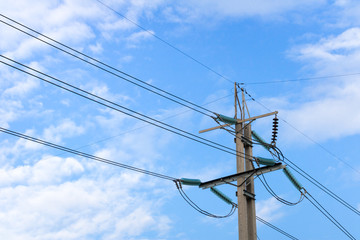 Electric pole with blue sky and white cloud