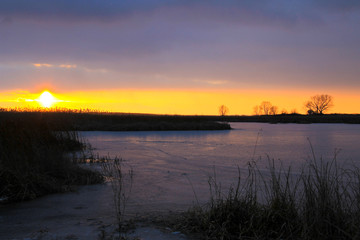 Sunset over the winter river