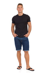 Cheerful Handsome Man In Jeans Shorts And Slipers