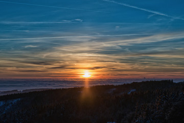 Amazing evening with sunset in Eagle mountains. Beautiful sunset within inversion