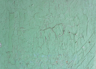 Green old painted cracky wooden background