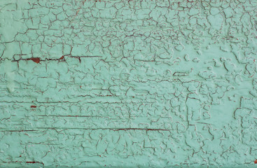 Green old painted cracky wooden background