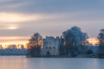 Medieval Castle by a Lake in Winter