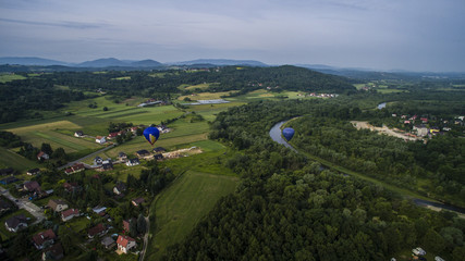 Balloons over river