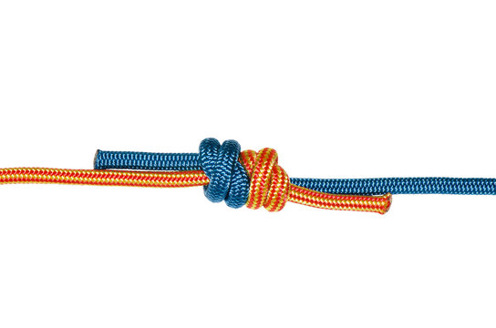 Grapevine knot, blue and orange rope.