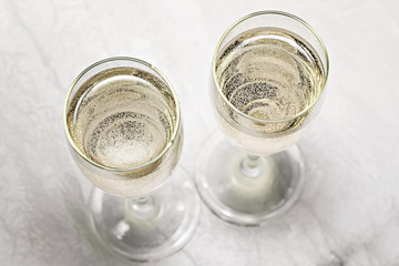 two glasses of champagne in a close-up top view