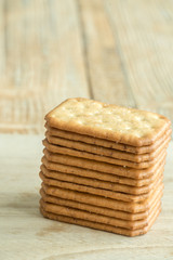 Fototapeta na wymiar Stacked Biscuits on wooden background