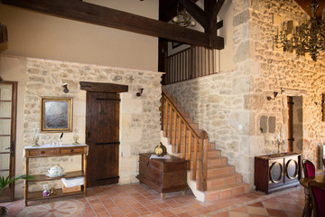 Fototapeta na wymiar interior of an old house with wooden and stone