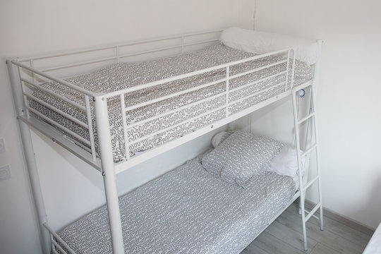 bed layer in a room white place for kids