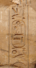 Ancient Egypt. wall are decorated with carved hieroglyphs. Karnak Temple. Luxor. Thebes.