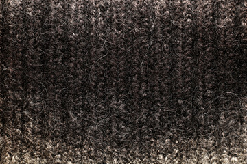 The texture of the neck of female winter warm sweater overflow white black