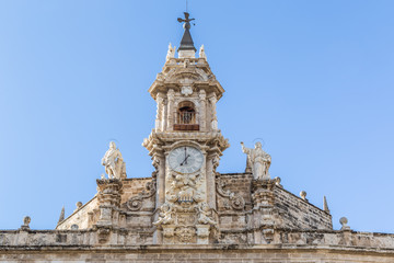 Fototapeta na wymiar Top site of the facade of Casa Consistorial, City Hall of Valencia in Spain