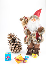 vintage Santa Claus doll with pincone and gift boxes