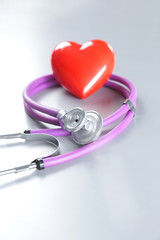 Stethoscope and medical equipment on a light background