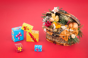 Christmas decoration coffer and gift boxes on red background