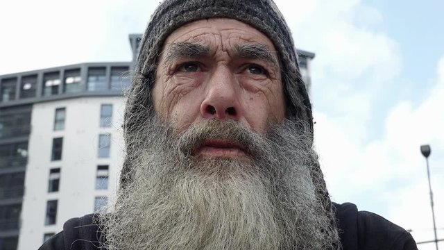 real old homeless portrait: elderly poor man 
