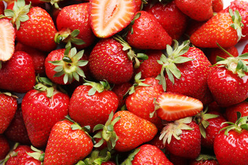 Fresh and tasty strawberries background, close up