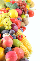 Ripe and tasty fruits and vegetables on a white background