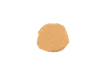 Sweet chocolate truffle isolated on a white