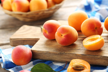 Ripe apricots fruit on grey wooden table