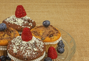 Muffins with raspberries and blueberries