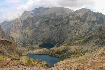 Fototapeta na wymiar The Capitellu and Melo lakes from GR20 trail, Corse, France.