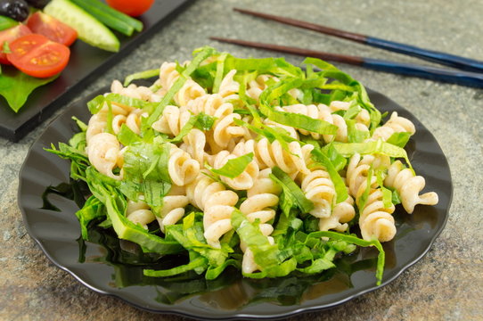 wild onion pasta with chopsticks