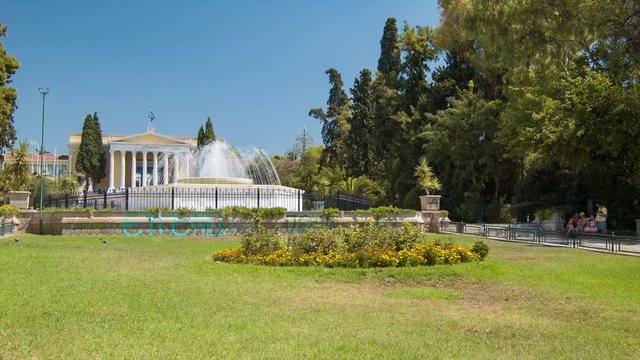 Athens Greece Fountains at The Zappeion Historical Stately Hall Landmark Building Exterior with Visiting Tourists on a Sunny Day