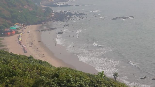 Paragliding over the mountains and the ocean near the beach Kalach