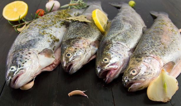 trout on a wooden table