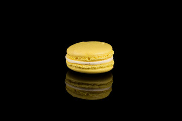 Colorful macaroon over black background