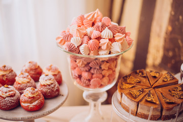 Fototapeta na wymiar Delicious wedding reception candy bar dessert table