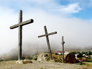 Three crosses on a hill