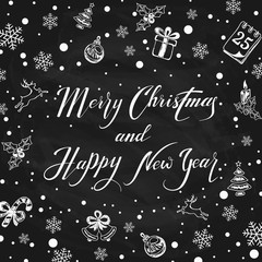 Merry Christmas and Happy New Year with decorations on black cha