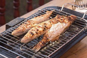 Fish perch baked at home on the grill