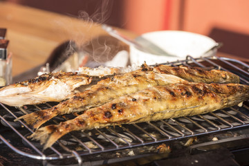 Fish perch baked at home on the grill