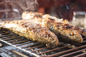 Fish perch baked at home on the grill