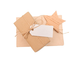 gift box of kraft paper with tag for text on white background