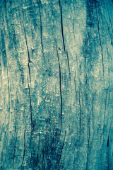 Fototapeta na wymiar Painted plain blue and rustic wood board background. Tinted photo.