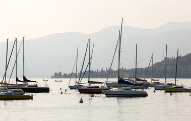 Sailboats  at Porto di Bardolino harbor on The Garda Lake . Italy
