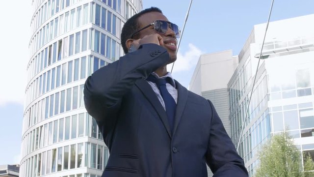 Businessman Using cell Phone: conversation, phone call, talking